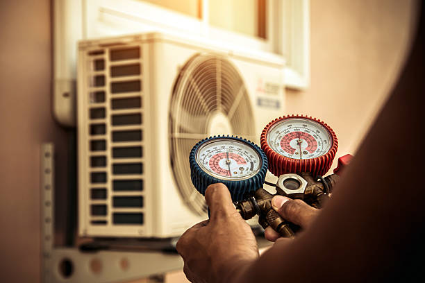 Professional Heat Pump Repair technician working in May, TX
